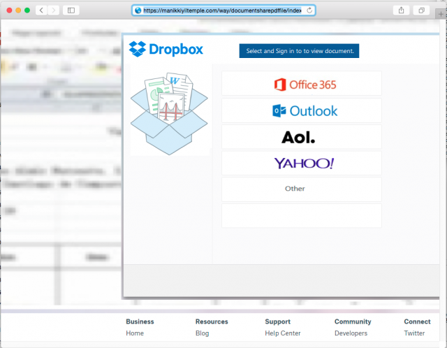 A fake Drop Box login page is presented by the link.